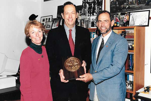 Pam and Gary receive award from Senator Bill Bradley