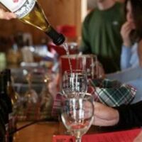 Terhune Orchards tasting room wine pouring
