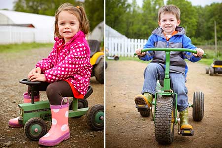 Kids on pedal tractors