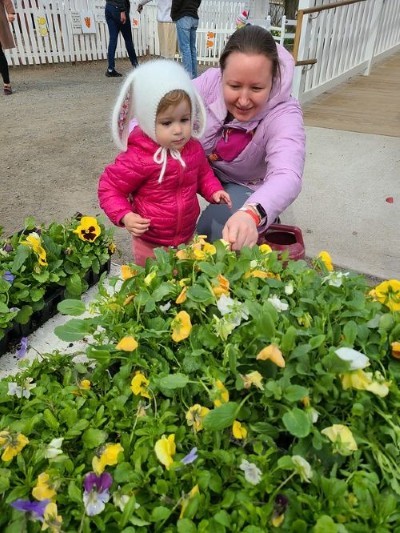 girl bunny ears and mom spring flowers